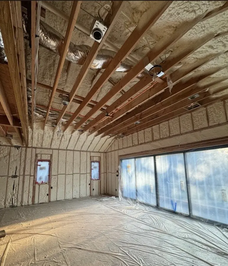 Interior walls and ceiling insulated with spray foam during new construction in Hot Springs Village